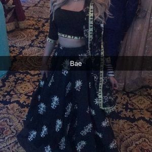 Black and gold lengha available with 2 blouses